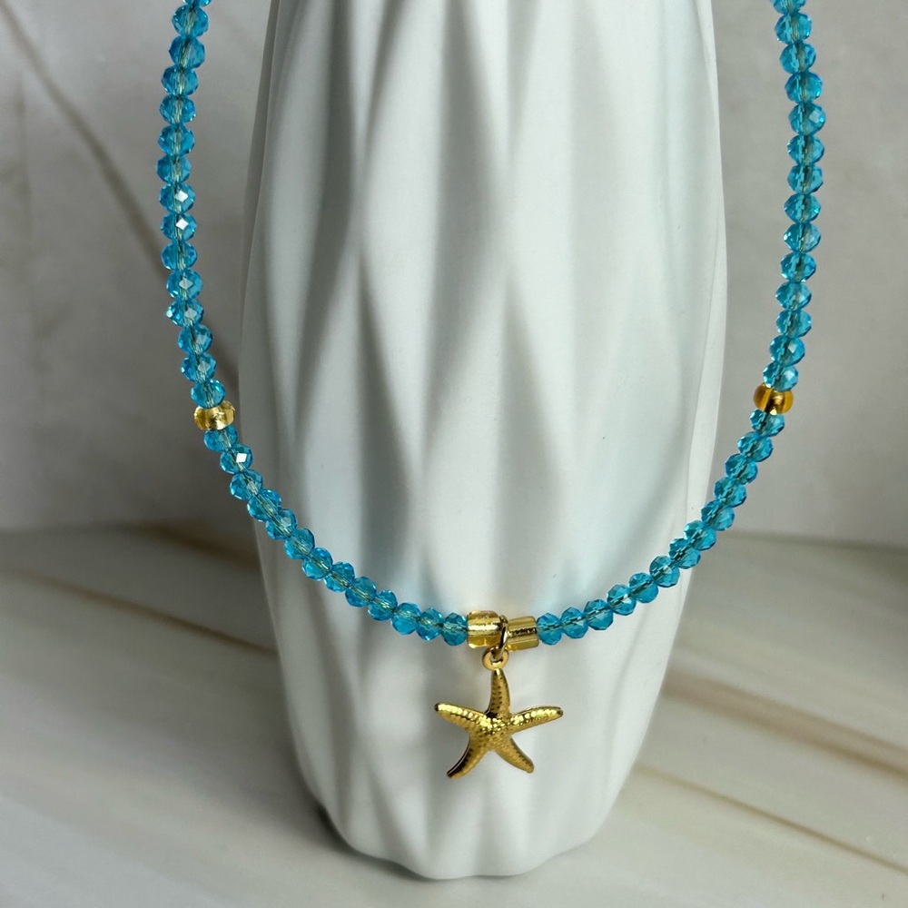 Elegant Blue Beaded Necklace with Gold Starfish Charm
